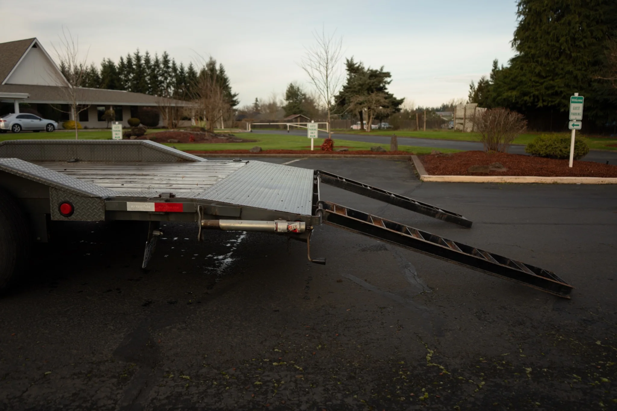 8.5×20 car hauler — loading ramps deployed