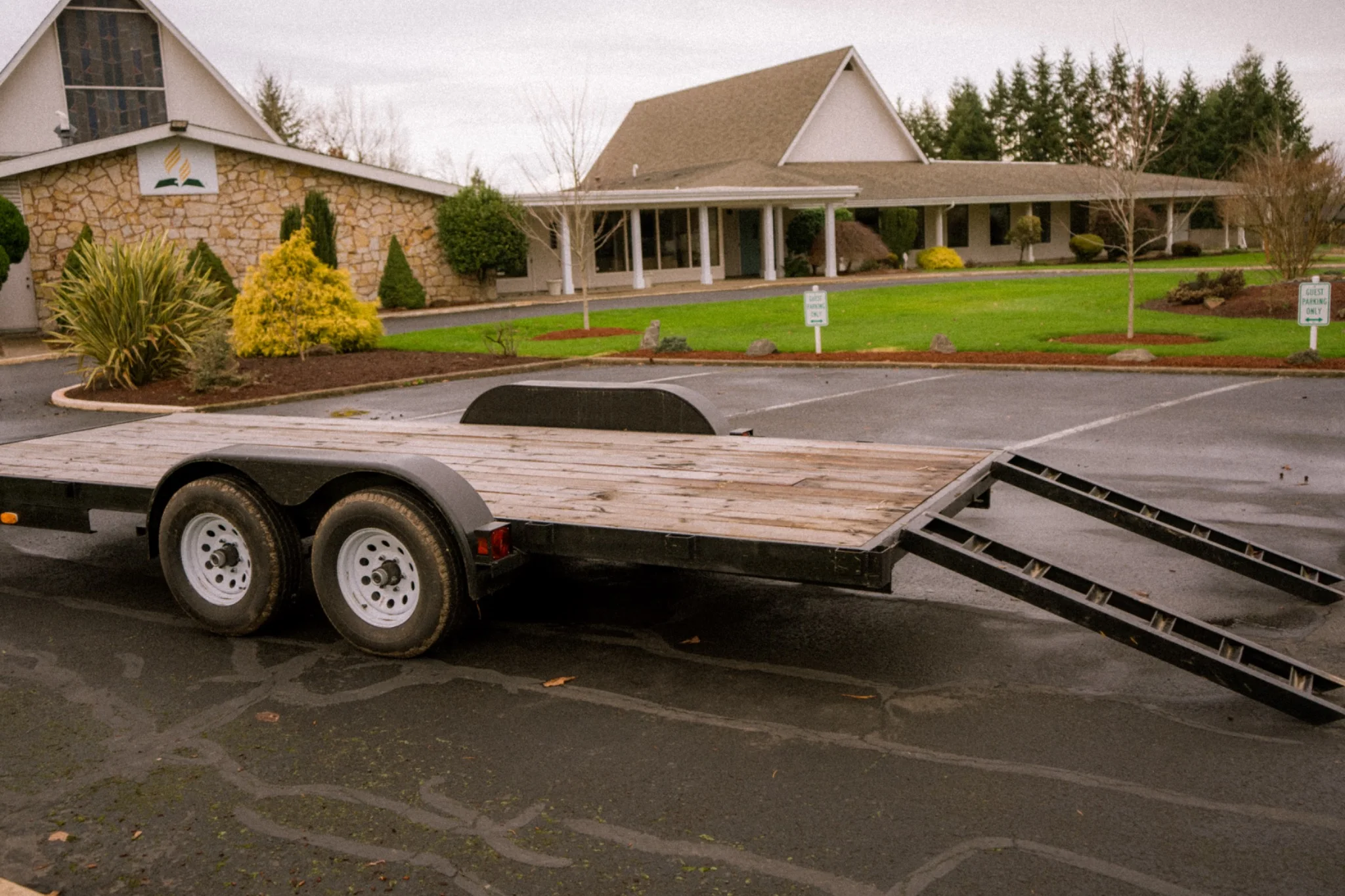 7×18 flatbed trailer — rear loading ramps deployed